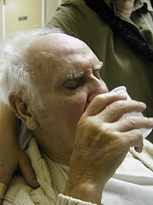 Grandpa drinking water
